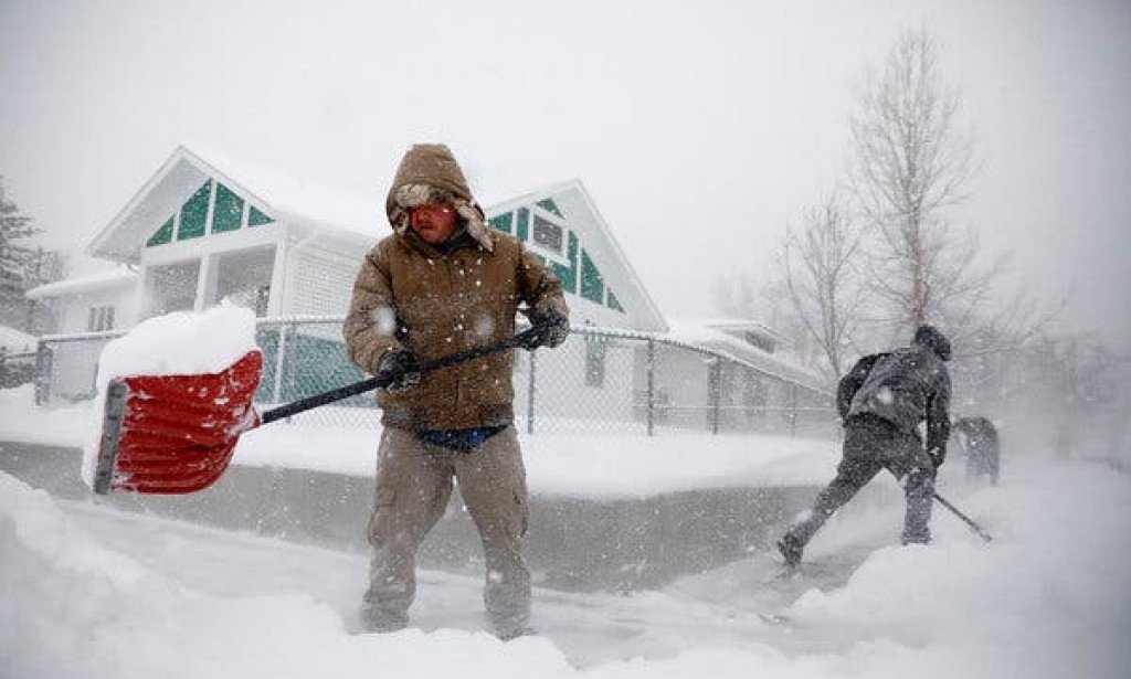 US East Coast covered by 'bomb beginning's blizzard