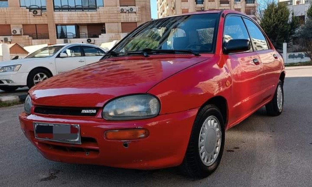 مواصفات و مميزات وعيوب سيارة مازدا 121